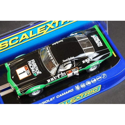 278 - Four cased Scalextric slot cars to include C2920 Ford Escort RS 1600 No 1, C3612 Chevrolet Camaro 19... 