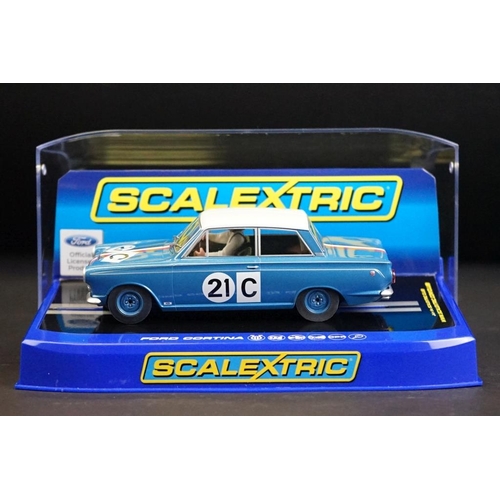 279 - Four cased Scalextric slot cars to include C3670 Ford Cortina GT 1964 Bathurst, C3671 Ford Mustang 2... 