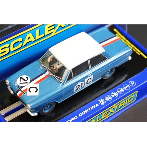 279 - Four cased Scalextric slot cars to include C3670 Ford Cortina GT 1964 Bathurst, C3671 Ford Mustang 2... 