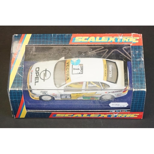 281 - Four cased Scalextric slot cars to include C.2000 Opel Vectra Promarkt, C.2091 BMW Teleshop, C.2006 ... 