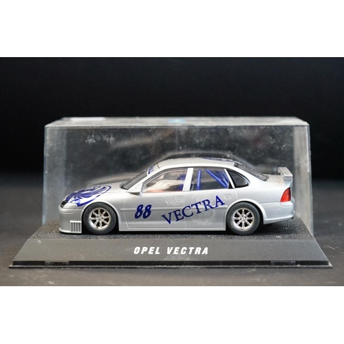 281 - Four cased Scalextric slot cars to include C.2000 Opel Vectra Promarkt, C.2091 BMW Teleshop, C.2006 ... 