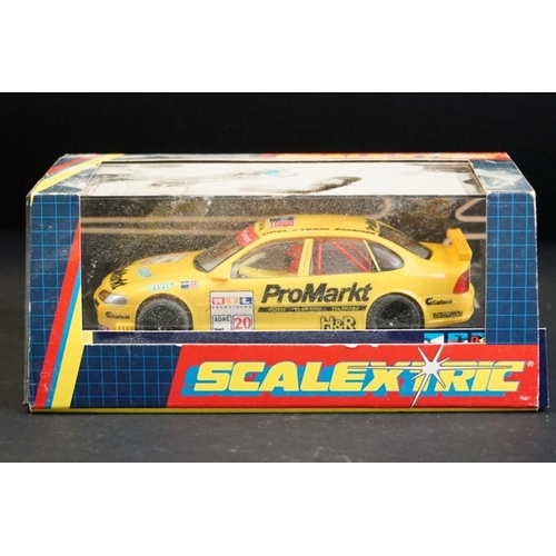 281 - Four cased Scalextric slot cars to include C.2000 Opel Vectra Promarkt, C.2091 BMW Teleshop, C.2006 ... 