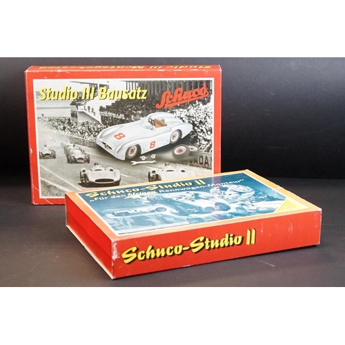 282 - Two boxed Schuco Studio clockwork tin plate model kit sets to include Studio III Bausatz Montagekast... 