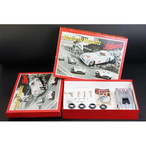 282 - Two boxed Schuco Studio clockwork tin plate model kit sets to include Studio III Bausatz Montagekast... 