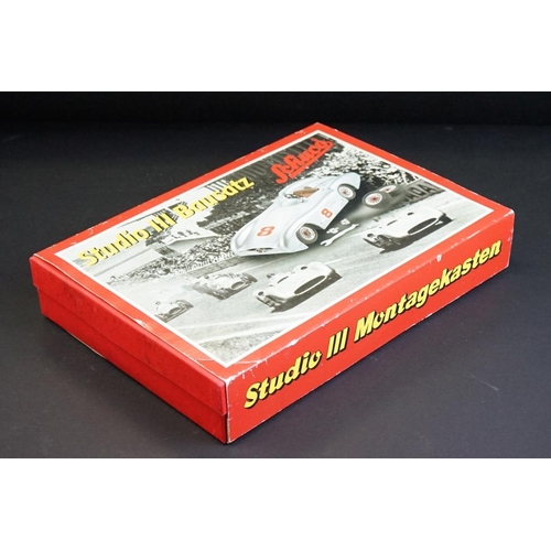 282 - Two boxed Schuco Studio clockwork tin plate model kit sets to include Studio III Bausatz Montagekast... 