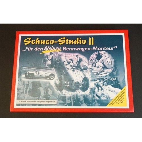 282 - Two boxed Schuco Studio clockwork tin plate model kit sets to include Studio III Bausatz Montagekast... 