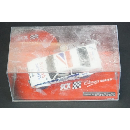 283 - Four boxed / cased SCX slot cars to include 2 x SCX TT 4x4 Racing System (73020 Peugeot 405 