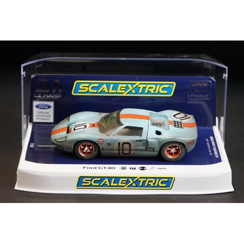 286 - Seven cased Scalextric slot cars to include C4182 Ford Mustang GT4, C4036 Aston Martin Vantage GT3, ... 