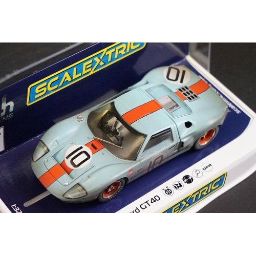 286 - Seven cased Scalextric slot cars to include C4182 Ford Mustang GT4, C4036 Aston Martin Vantage GT3, ... 