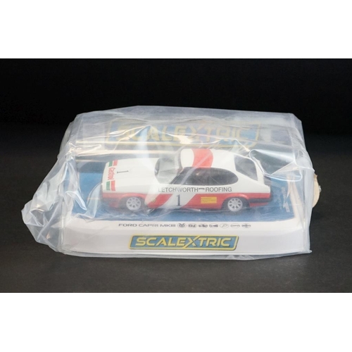 286 - Seven cased Scalextric slot cars to include C4182 Ford Mustang GT4, C4036 Aston Martin Vantage GT3, ... 