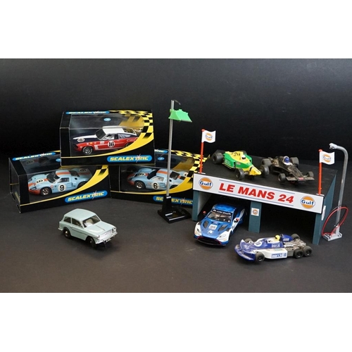 287 - Three cased Scalextric slot cars to include C2403 Ford GT 40 1968 No 9, C2404 Ford GT40 1969 No 6, C... 