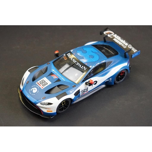 287 - Three cased Scalextric slot cars to include C2403 Ford GT 40 1968 No 9, C2404 Ford GT40 1969 No 6, C... 