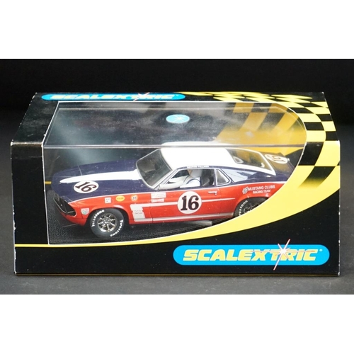 287 - Three cased Scalextric slot cars to include C2403 Ford GT 40 1968 No 9, C2404 Ford GT40 1969 No 6, C... 