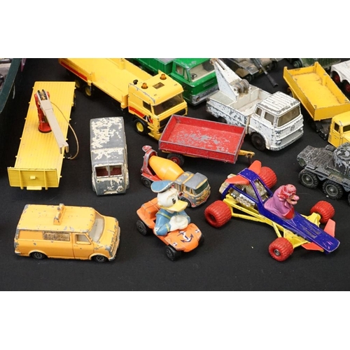 1264 - 65 play worn diecast models, mainly mid 20th C examples, to include Corgi, Dinky, Matchbox, etc, fea... 