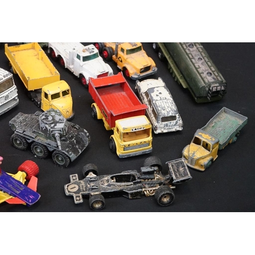 1264 - 65 play worn diecast models, mainly mid 20th C examples, to include Corgi, Dinky, Matchbox, etc, fea... 