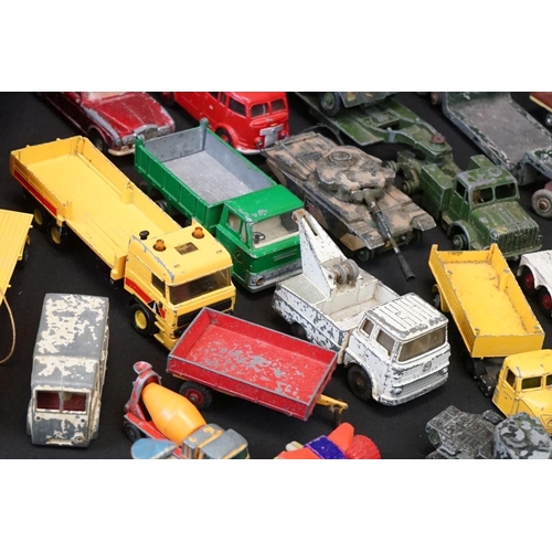 1264 - 65 play worn diecast models, mainly mid 20th C examples, to include Corgi, Dinky, Matchbox, etc, fea... 