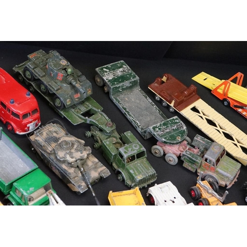 1264 - 65 play worn diecast models, mainly mid 20th C examples, to include Corgi, Dinky, Matchbox, etc, fea... 