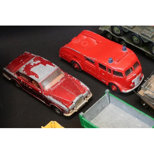 1264 - 65 play worn diecast models, mainly mid 20th C examples, to include Corgi, Dinky, Matchbox, etc, fea... 