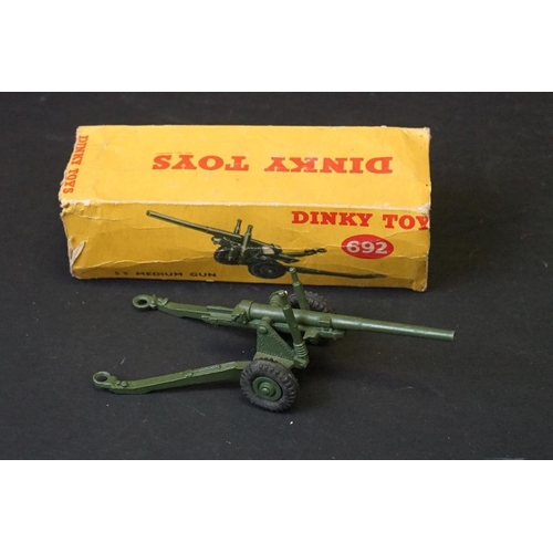 1270 - Around 28 mid 20th C play worn diecast models to include 9 x boxed Dinky military models (643, 673, ... 