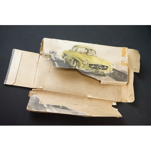 1254A - Two boxed tin plate models to include JNF M300 Nr 67F Friction Mercedes in cream and Arnold Mercedes... 