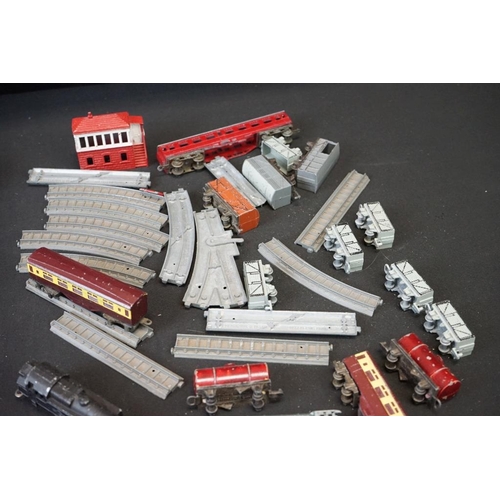 1257 - Seven mid 20th C Dinky play worn diecast models to include Triumph TR2 & Austin Devon plus a group o... 