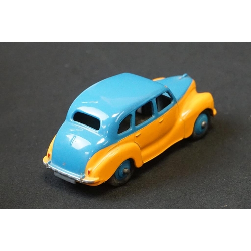 1257 - Seven mid 20th C Dinky play worn diecast models to include Triumph TR2 & Austin Devon plus a group o... 