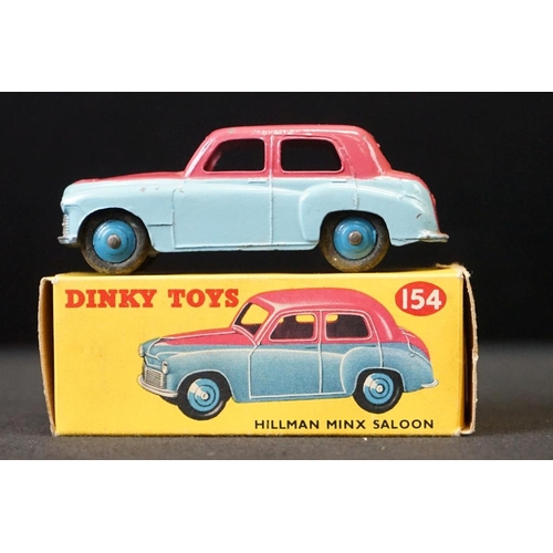 1258 - Two boxed Dinky diecast models to include 154 Hillman Minx Saloon in two tone cerise & pale blue (te... 