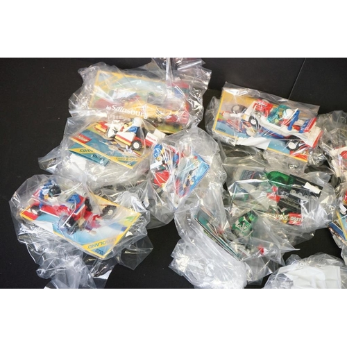 187 - Lego - 21 Lego vehicles, circa 1990's, to include 6526 Red Line Racer, 6509 Red Devil Racer, 1731 Ic... 