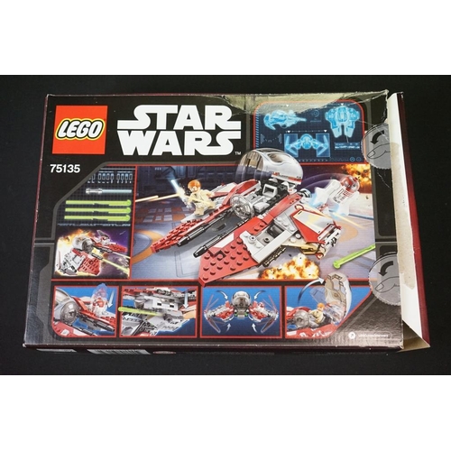 196 - Lego - Four boxed Star Wars Lego sets to include 75105 Millennium Falcon (previously built, missing ... 