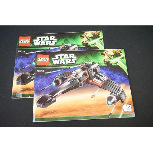 197 - Lego - Four boxed Star Wars Lego sets to include 75018 Jek-14's Stealth Starfighter (part built, mis... 