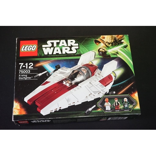 197 - Lego - Four boxed Star Wars Lego sets to include 75018 Jek-14's Stealth Starfighter (part built, mis... 