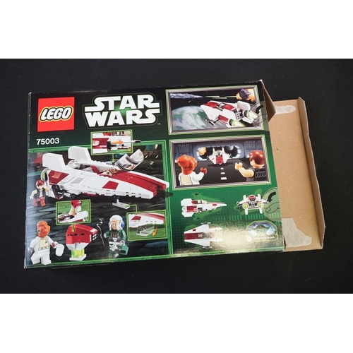 197 - Lego - Four boxed Star Wars Lego sets to include 75018 Jek-14's Stealth Starfighter (part built, mis... 