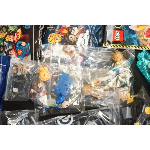 202 - Lego - Quantity of superhero Lego to include opened minifigures, boxed Ninjago Movie 70606 set, boxe... 