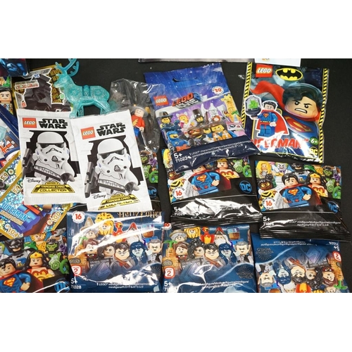 202 - Lego - Quantity of superhero Lego to include opened minifigures, boxed Ninjago Movie 70606 set, boxe... 