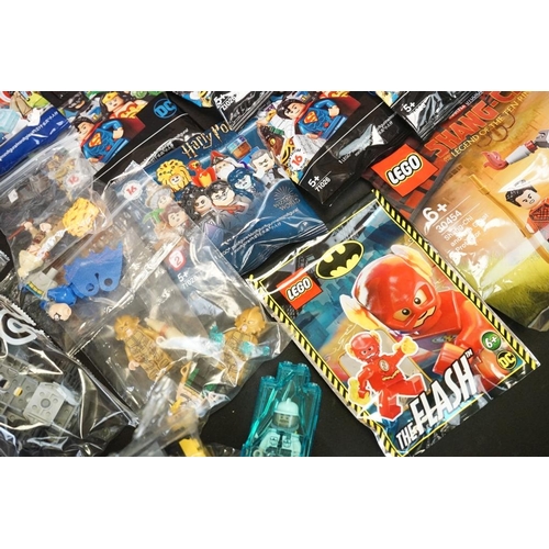 202 - Lego - Quantity of superhero Lego to include opened minifigures, boxed Ninjago Movie 70606 set, boxe... 