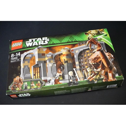 207 - Lego - Three boxed Star Wars Lego sets to include 75005 Rancor Pit (previously built, missing mini f... 