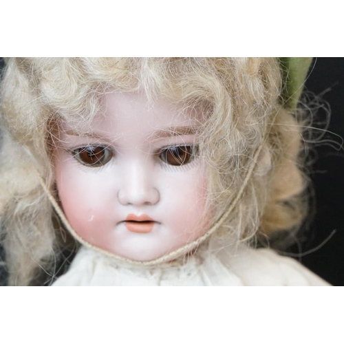 390 - Four Early 20th century Armand Marseille Bisque Head Dolls, impressed marks 'D.R.G.M  246/1 A.1.M', ... 