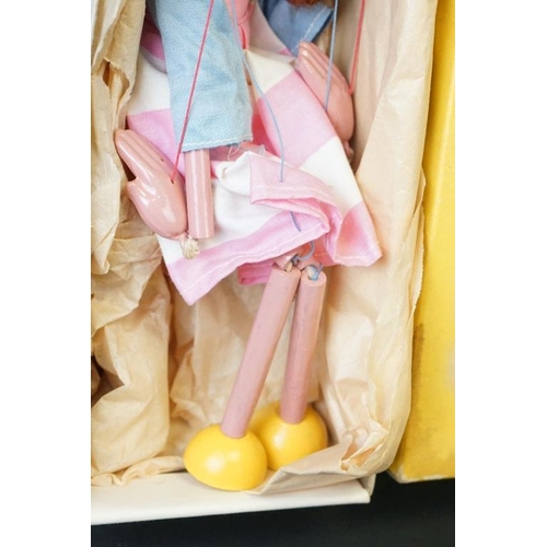 393 - Two boxed Pelham Puppets to include Bengo the dog and girl in pink & blue with pink hat, overall con... 