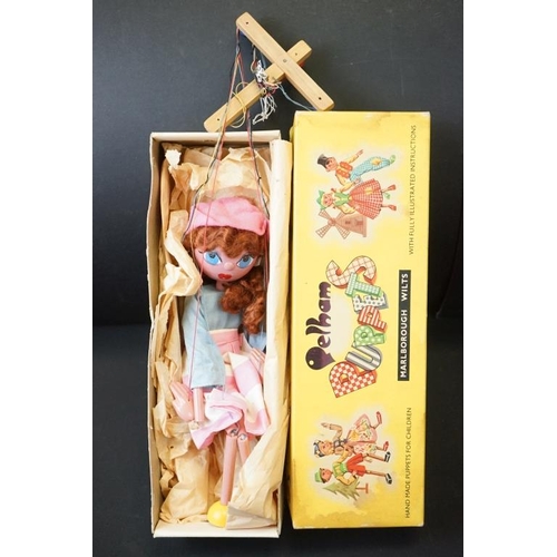 393 - Two boxed Pelham Puppets to include Bengo the dog and girl in pink & blue with pink hat, overall con... 