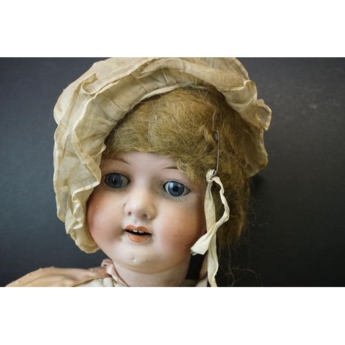 398 - Two Early 20th century Heubach Koppelsdorf Bisque Head Dolls, one with impressed marks 302.9 with fi... 