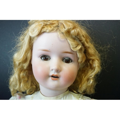 401 - Two Early 20th century Schoenau Hoffmeister Bisque Head Doll, one with impressed marks 914 with brow... 