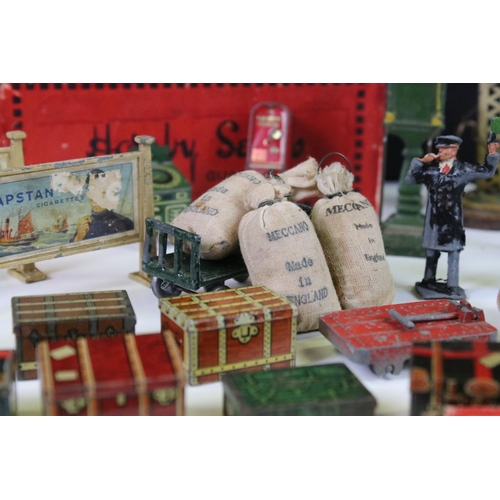 132 - Large group of O gauge station & trackside accessories containing many scare items to include 7 x ti... 