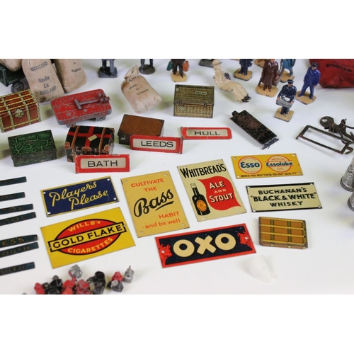 132 - Large group of O gauge station & trackside accessories containing many scare items to include 7 x ti... 