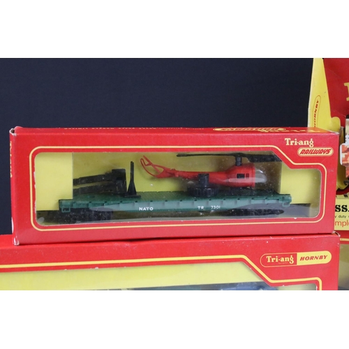 134 - Six boxed Triang OO gauge items of rolling stock to include Battle Space R568 Assault Tank Transport... 