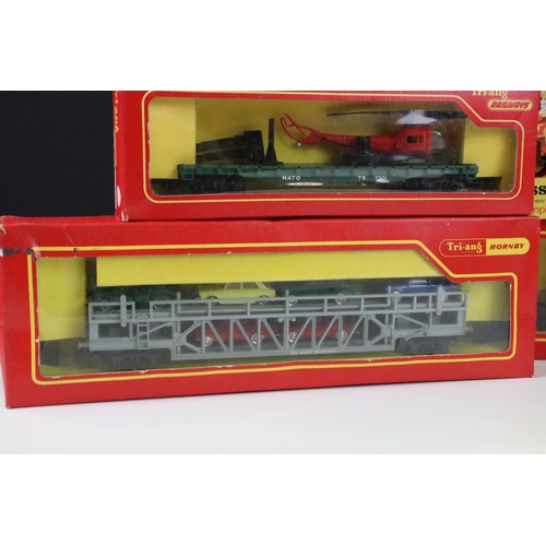 134 - Six boxed Triang OO gauge items of rolling stock to include Battle Space R568 Assault Tank Transport... 