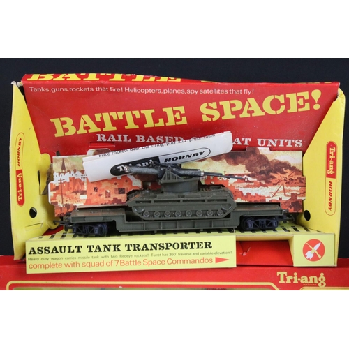 134 - Six boxed Triang OO gauge items of rolling stock to include Battle Space R568 Assault Tank Transport... 