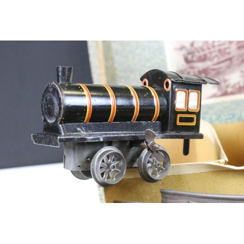 140 - Two early-mid 20th C boxed tin plate train sets to include Brimtoy Clockwork Train No 37/0 Colour GN... 