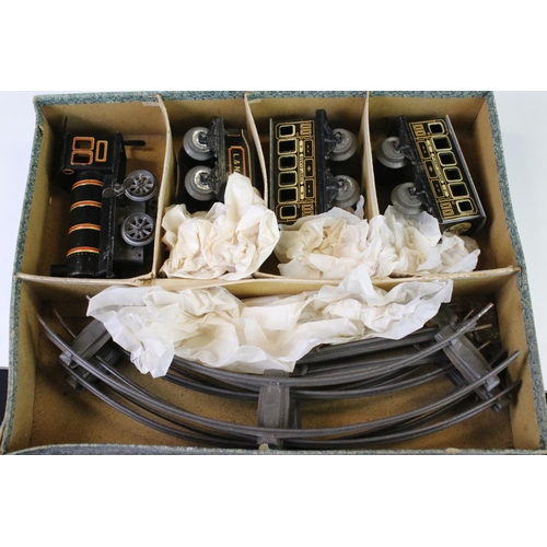 140 - Two early-mid 20th C boxed tin plate train sets to include Brimtoy Clockwork Train No 37/0 Colour GN... 