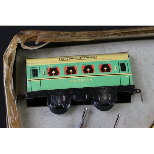 140 - Two early-mid 20th C boxed tin plate train sets to include Brimtoy Clockwork Train No 37/0 Colour GN... 