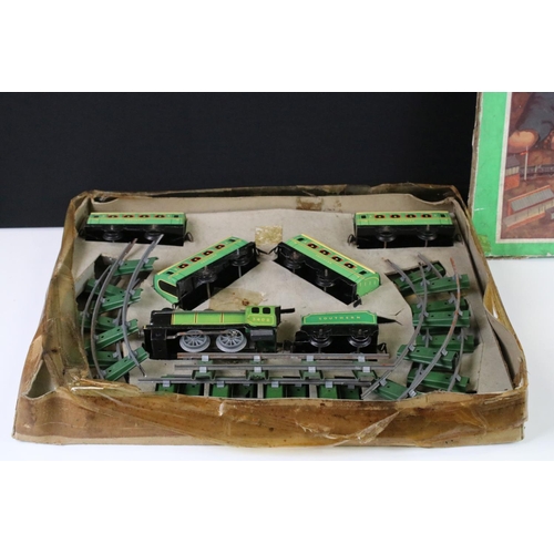 140 - Two early-mid 20th C boxed tin plate train sets to include Brimtoy Clockwork Train No 37/0 Colour GN... 